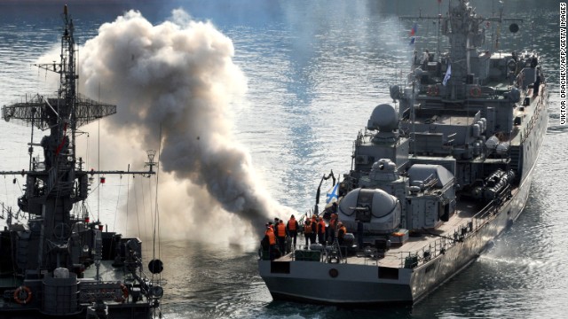 Russian sailors stand on the deck of the corvette ship Suzdalets in the bay of Sevastopol, Crimea, on March 25.