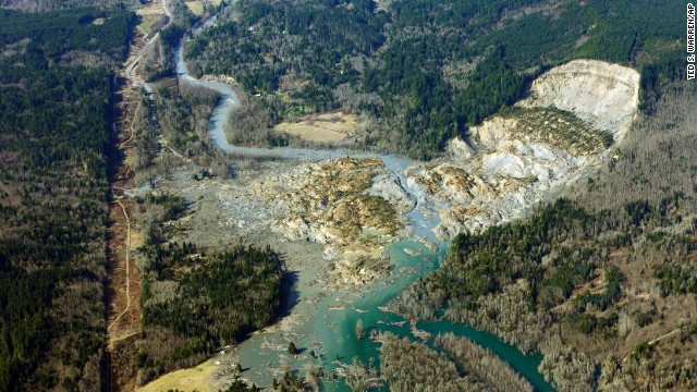 The remains of the massive landslide are seen on Monday, March 24. The landslide blocked the highway and the Stillaguamish River.