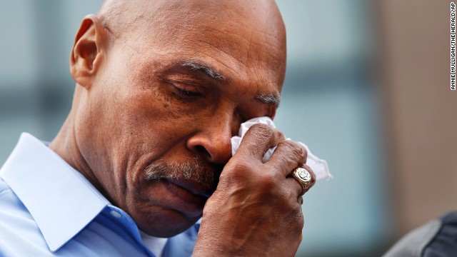 Snohomish County Executive John Lovick wipes a tear during a briefing in downtown Arlington on March 24.