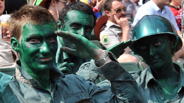 <strong>Three</strong> saluting soldiers...