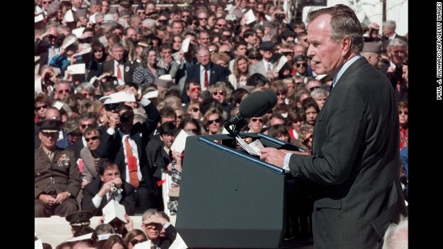 In November 1997, Bush speaks at the dedication of his presidential library at Texas A&M University.