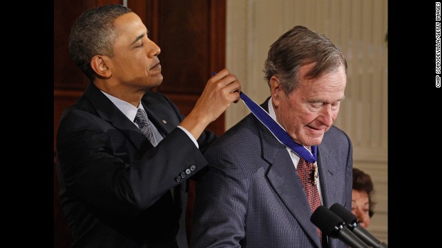 President Barack Obama presents Bush with the 2010 Medal of Freedom at the White House in February 2011. 