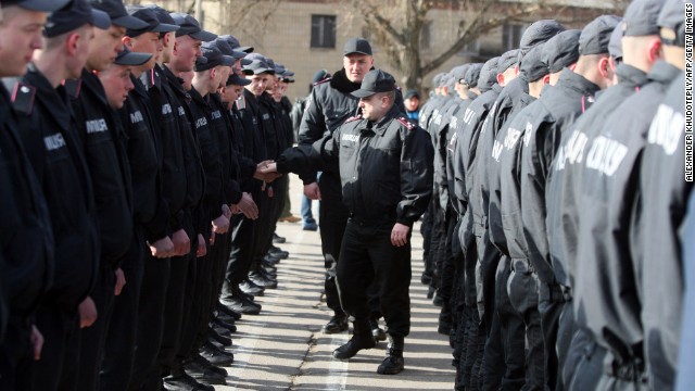 Ukrainian soldiers take part in a training exercise at a military base in Donetsk, Ukraine, on Saturday, March 29.