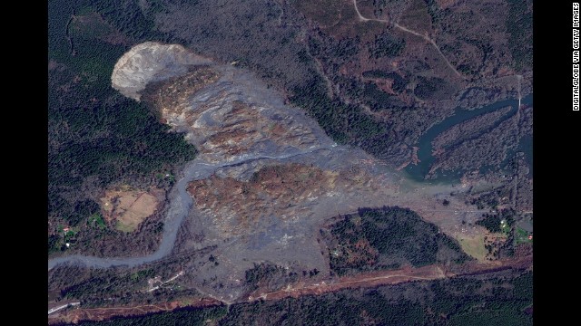 This satellite image taken on Monday, March 31, shows the path of the landslide.