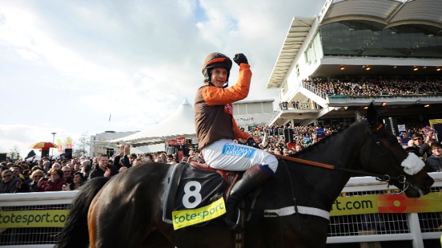 Waley-Cohen is no stranger to victory on Long Run, his mount on Saturday. Here he celebrates winning the 2011 Cheltenham Gold Cup.