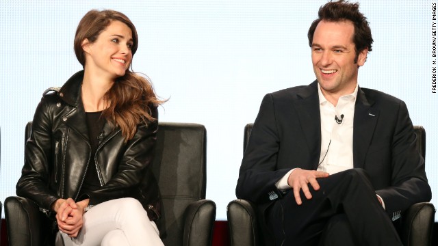 "The Americans" actors Keri Russell and Matthew Rhys are so good at playing a couple on the screen they have several onlookers wondering if they're a match in real life. Russell, who broke up with her husband of almost seven years in December, <a href='http://www.people.com/people/article/0,,20802179,00.html' >has been seen spending quality time off-set with her co-star</a>. If they do become an item, they'll join these famous couples whose romance went from reel to real: