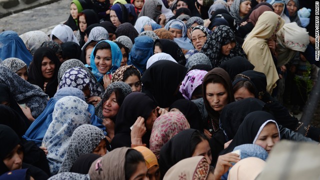 Female voters crowd outside a polling station in Kabul.