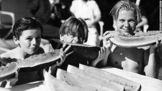 Rooney, center, is seen with fellow young Hollywood actors Jackie Cooper, right, and Freddie Bartholomew circa 1930.