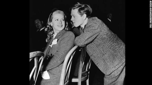 Rooney talks with Lana Turner in the late 1930s.