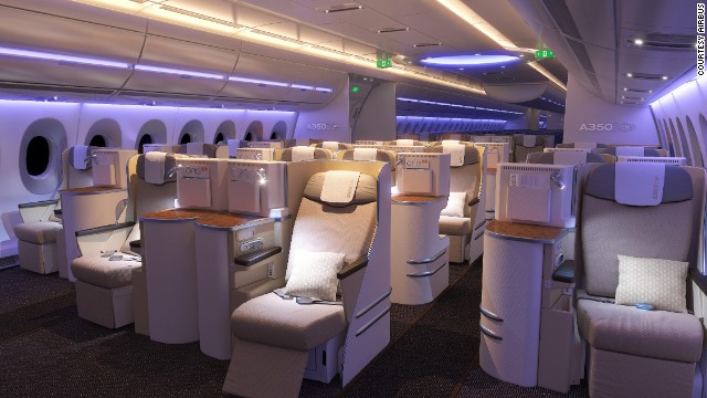 Airbus unveiled the interior cabin on two of its A350 XWB test planes. LED lighting and near-vertical side walls are two of the plane-maker's innovations. 