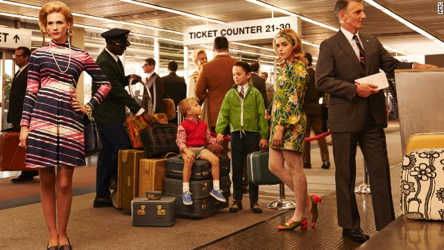 The Francis family shows off some fancy traveling duds in this promotional photo for the seventh season. Notice that the boys are wearing sneakers, but they're also wearing a vest and tie, she said. Sally's style is fashion forward but still formal, and appropriate for airplane travel at the time.