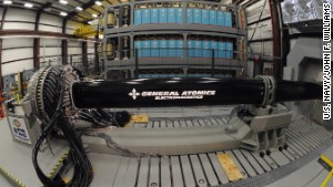 The EM Railgun launches projectiles using electricity instead of chemical propellants.