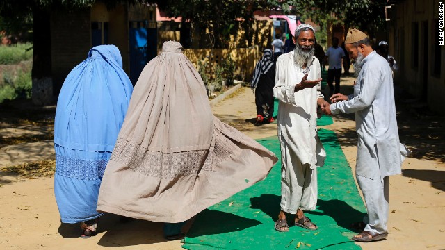 Voters leave a polling station in Muzaffarnagar on April 10.