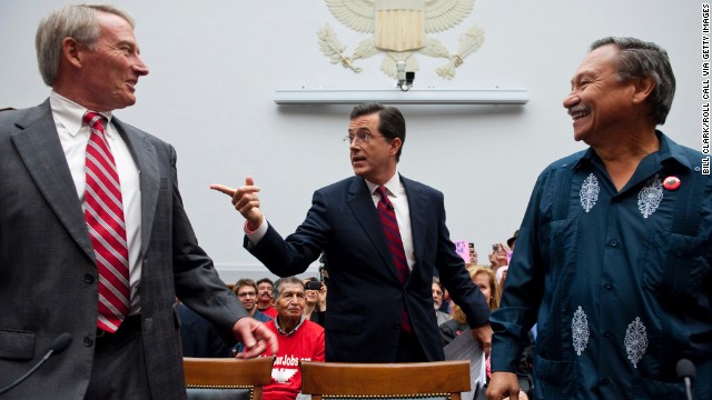 In September 2010, Colbert testified at a hearing on immigration. He took time to chat with Phil Glaize, chairman of the U.S. Apple Association, left, and Arturo Rodriguez, president of the United Farm Workers. Again, some representatives didn't get Colbert. 