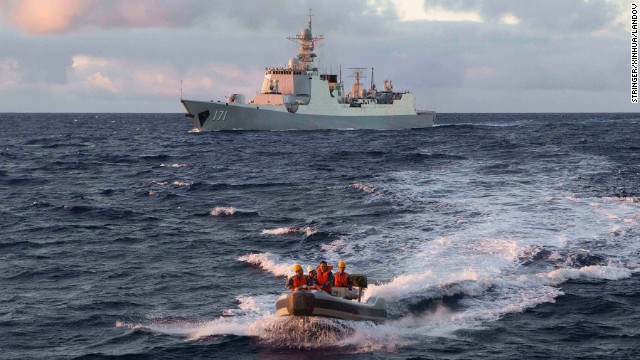 Chinese navy personnel head out on a boat to the Royal Australian Navy ship HMAS Success on Wednesday, April 9.