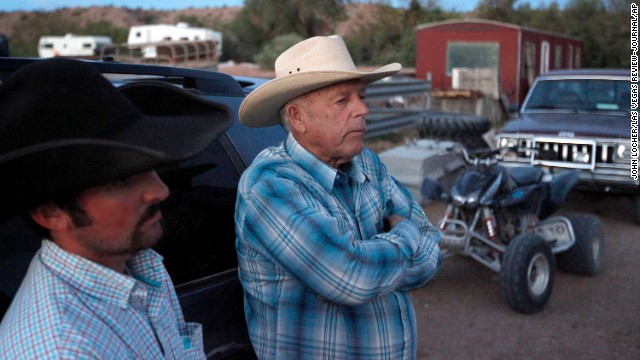 Cliven Bundy, right, and Clance Cox stand at the Bundy ranch on April 5.