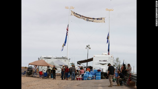 People gather at a protest area along State Route 170, near the cattle roundup on April 11.