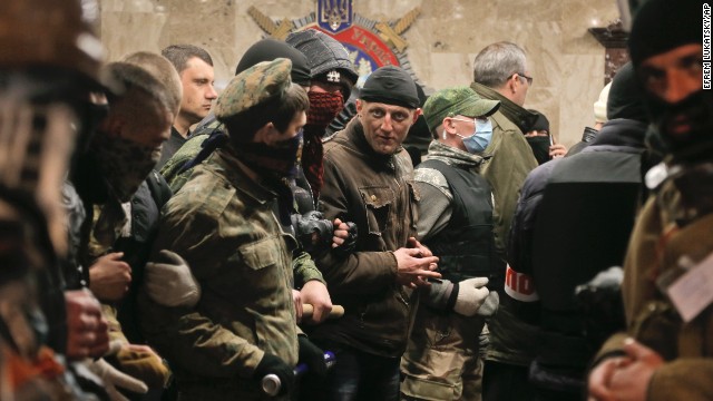 Pro-Russian activists occupy the regional police office in Donetsk, Ukraine, on Saturday, April 12. 