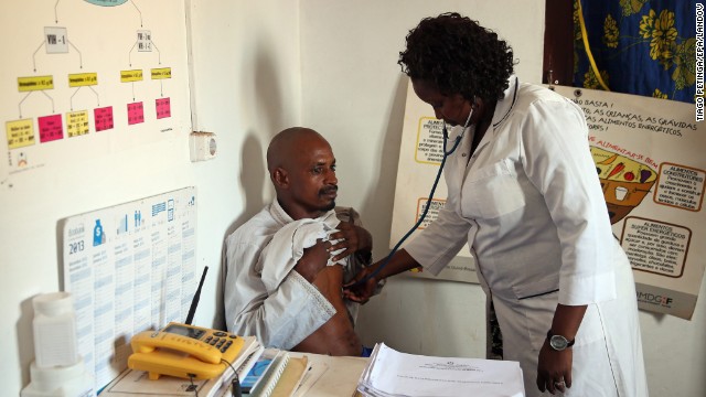 Guinea-Bissau nurse Egidia Almeida scans a Guinean citizen coming from Conakry on April 8. Dozens of people have died from an Ebola outbreak in coastal West Africa, aid workers reported.