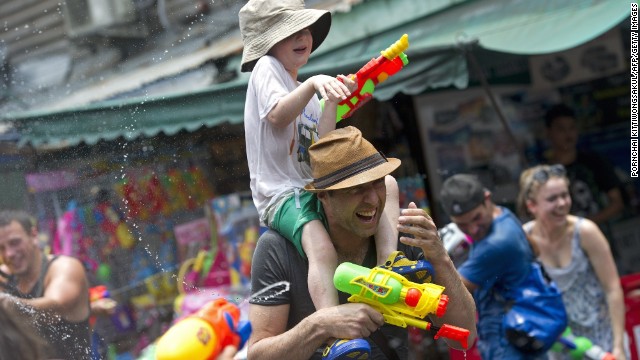 Foreign tourists take part in water battles during Thailand's Songkran Festival at Khao San Road in Bangkok (pictured). Chiang Mai has a reputation for the wildest Songkran festivities. 