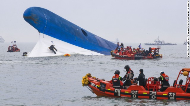 South Korean Coast Guard members search for survivors from the Sewol, a South Korean ferry, as it sinks in the Yellow Sea on Wednesday, April 16. It's not yet known what caused the incident.