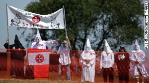 A member of the Confederate White Knights speaks during a rally at the Antietam National Battlefield September 7, 2013 near Sharpsburg, Maryland. T