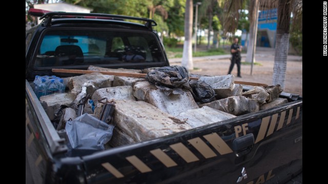 Drugs found by Brazilian federal police officers fill the back of a truck. Similar "pacification" programs have been staged in Rio's other favelas.