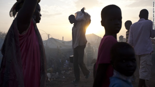 A man carries a bag on his shoulder at a camp in Malakal, South Sudan, on Wednesday, March 19.