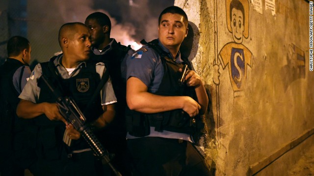 State military police stand in position during the protest.