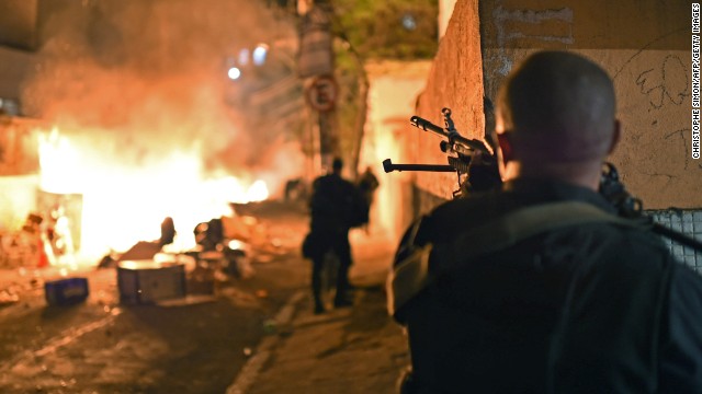 A special force police officer takes position during the protest.