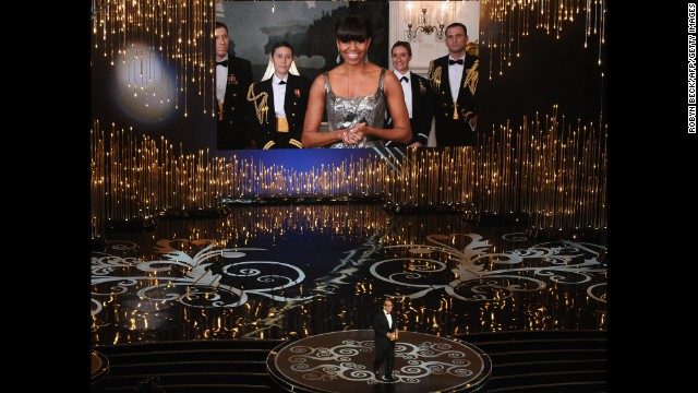 Via video, Obama announces the Oscar for Best Picture along with actor Jack Nicholson onstage at the 85th Annual Academy Awards on February 24, 2013. 