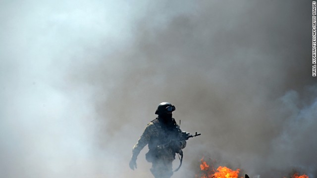 A Ukrainian special forces member takes position in Slavyansk.