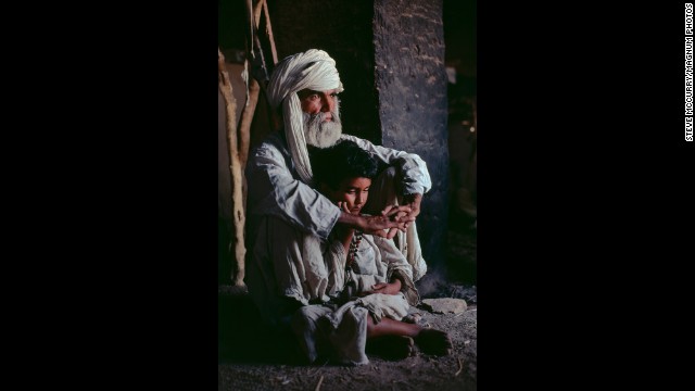 A father and son in Helmand province, 1980.