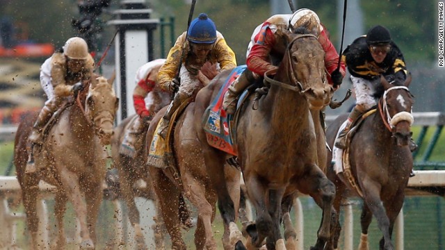 Last year's winner of a race billed as "the fastest two minutes in sport" was Orb, ridden through the mud to victory by jockey Joel Rosario.