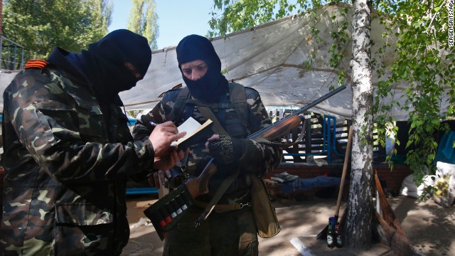 Pro-Russia militants keep records of their duty in Slavyansk on April 25.