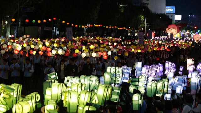 South Korean Buddhists carry lanterns in a parade in Seoul on Saturday, April 26, to honor the memory of the dead and the safe return of the missing from the sunken ferry Sewol. The parade was part of the Lotus Lantern Festival for the upcoming birthday of Buddha, on May 6. More than 100 people are dead and many more still are missing after the ferry sank Wednesday, April 16, as it headed to the resort island of Jeju from the port of Incheon.