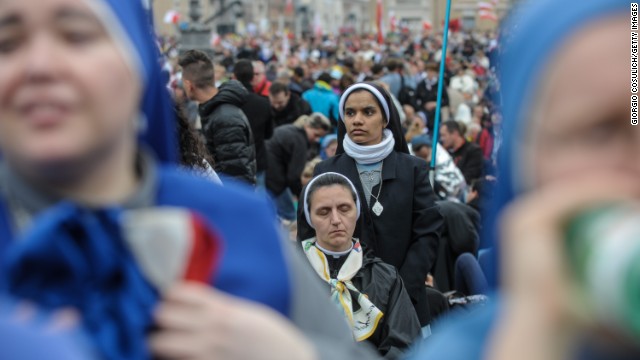 A group of nuns attends the canonization of Popes John Paul II and John XXIII.