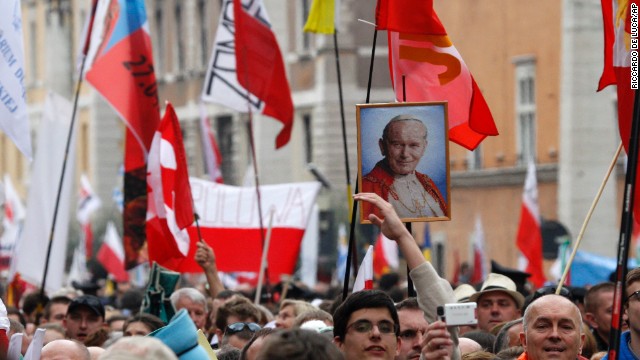 Pilgrims crowd St. Peter's Square to attend the ceremony for the canonizations of Pope John XXIII and Pope John Paul II on April 27.