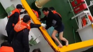 The image of Sewol ferry captain Lee Joon-seok being rescued in his shorts enraged South Korea. 