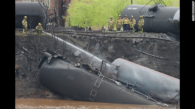 Police said 13 or 14 tanker cars were involved in the derailment.