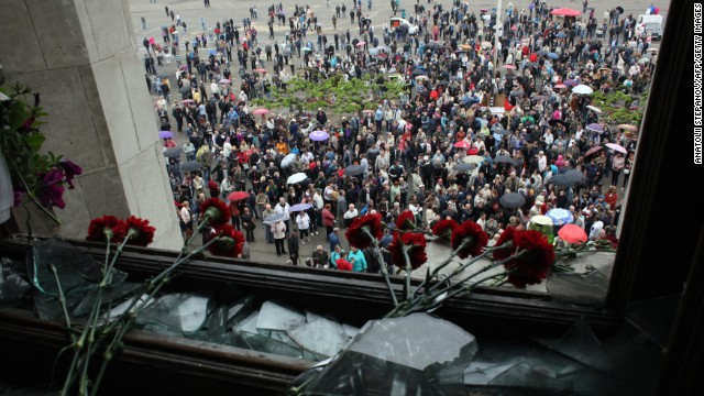 Red carnations are left inside the burned trade union building in Odessa on May 4. Flowers, candles and photos of the dead piled up outside the charred building, a day after brutal clashes and the fire claimed 46 lives.