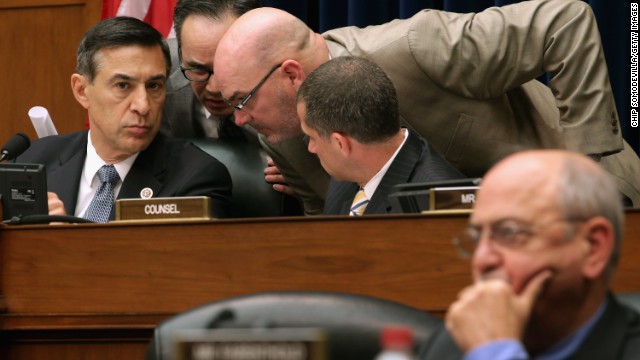 Rep. Darrell Issa, R-California, listens to aides at a Benghazi hearing in May 2013, one of many held since 2012.