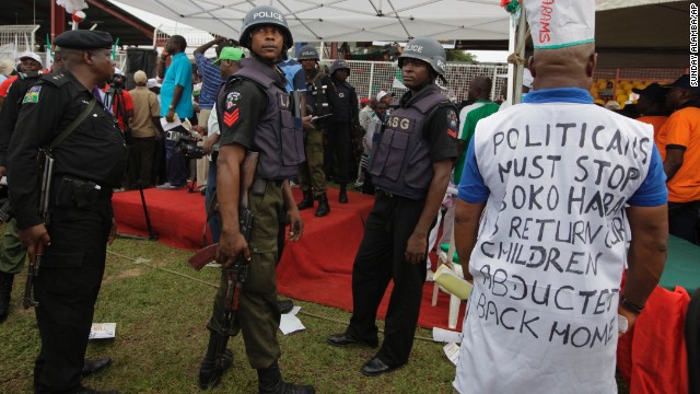 Police stand guard during a demonstration in Lagos on May 1.