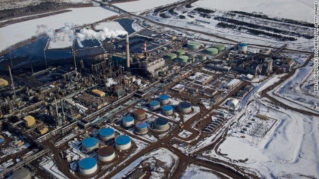 The Suncor Energy Inc. base plant is seen in this aerial photograph of the Athabasca Oil Sands near Fort McMurray, Alberta, Canada.