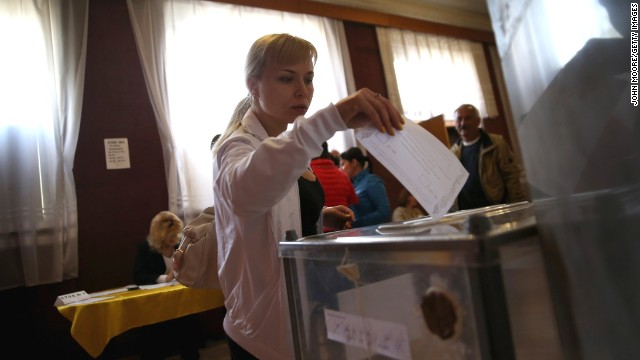 A voter casts her ballot in eastern Ukraine's independence referendum in Slovyansk on May 11.