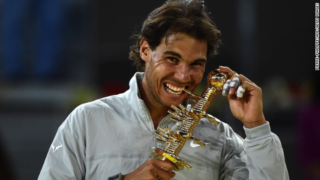 Rafael Nadal poses with the 2014 Madrid Masters trophy.