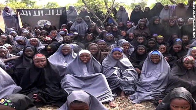 A screengrab taken on May 12, 2014, from a video of Nigerian Islamist extremist group Boko Haram obtained by AFP shows girls, wearing the full-length hijab and praying in an undisclosed rural location.