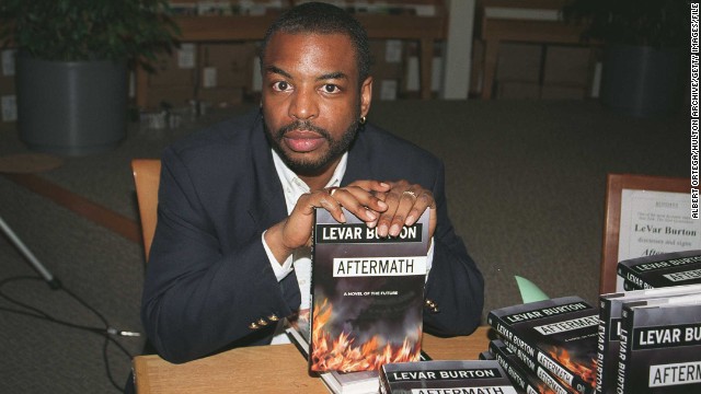 Burton signs his sci-fi novel, "Aftermath," at a Los Angeles bookstore in 1997. 