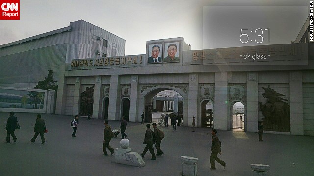 The words beside the two photos translate roughly as "Long live the The Great Leader Kim Jong-un," and "Long Live the Sun-Like Workers' Party of Korea."