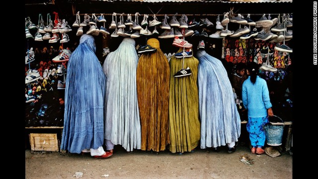 Afghan women shop at a shoe store in Kabul, 1992.